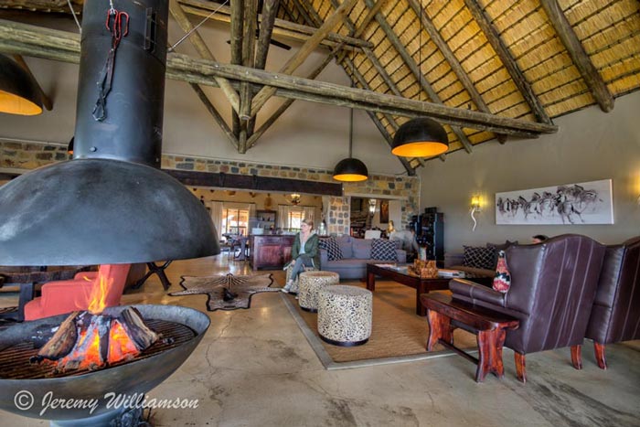 Fireplace lounge bar Luxury Lodge Umzolozolo Private Safari Lodge Nambiti Private Game Reserve KwaZulu-Natal South Africa